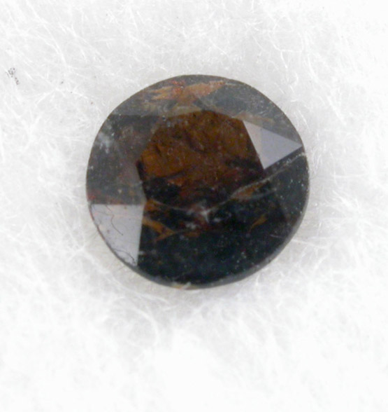 Faceted gemstone of dravite-uvite tourmalines (one of four in a set) from  Kingsbridge, Manhattan 