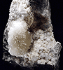 Mineral specimen: Natrolite on Calcite from Upper New Street Quarry, Paterson, New Jersey.