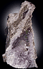 Mineral specimen: Quartz var. Amethyst, Prehnite, Calcite from Upper New Street Quarry, Paterson, New Jersey.